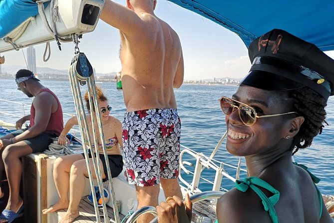 Authentic Barcelona Sailing Tour with Swim & Drinks - Drinks, Snacks, and What the Onboard Vibe Feels Like