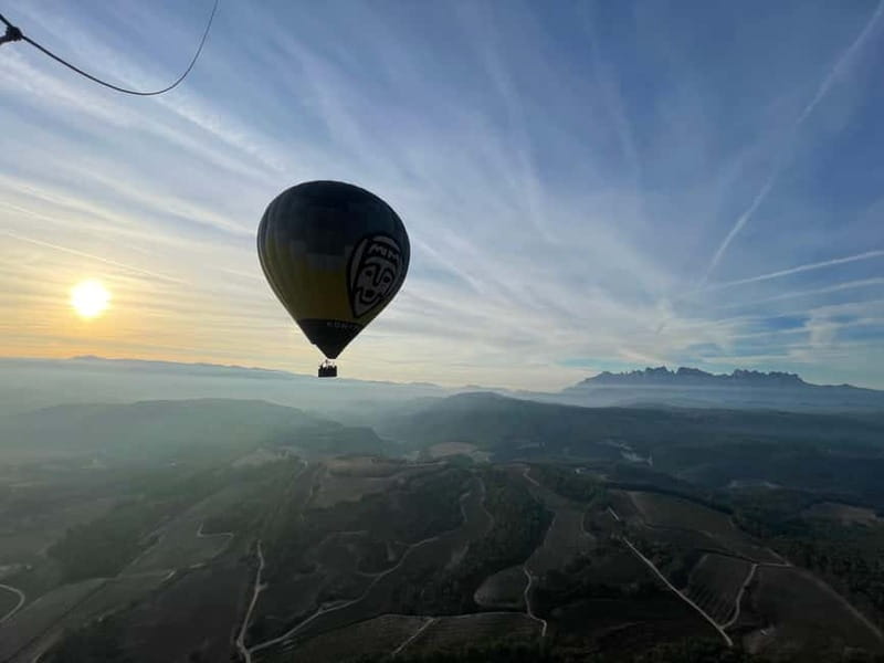 Balloon flight: panoramic view of Montserrat and Transport from Barcelona - The Secret Stop Celebration: Cava, Snacks, and Champagne Tasting
