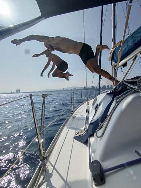 Barcelona Badalona : Sailboat Tour, Snacks, Drinks, Swimming - SUP and swimming break: fun for beginners, but sea conditions decide everything