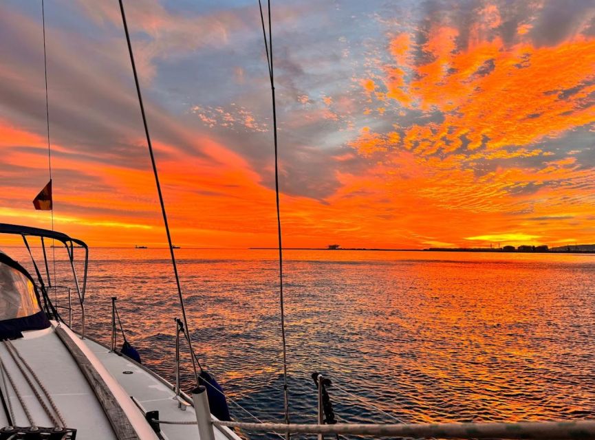 Barcelona: Boat trip with cava in amazing sailboat - The skyline sweep: Barceloneta, Olympic Village, and the beaches you see from the sea