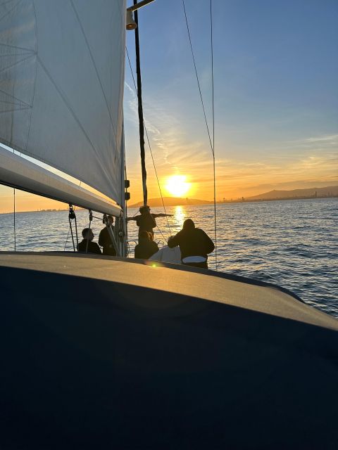 Barcelona: Boat trip with cava in amazing sailboat - Crystal-clear water and the Badalona swim stop