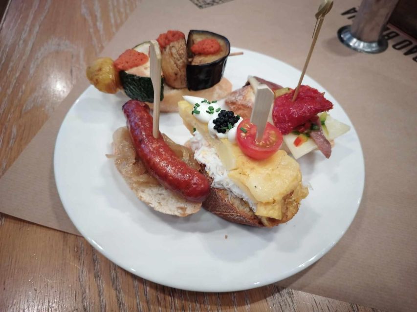 Barcelona: Boqueria Market & Barrio Gotico Street Food Tour - What you’ll actually taste: montaditos, croquettes, and vermut