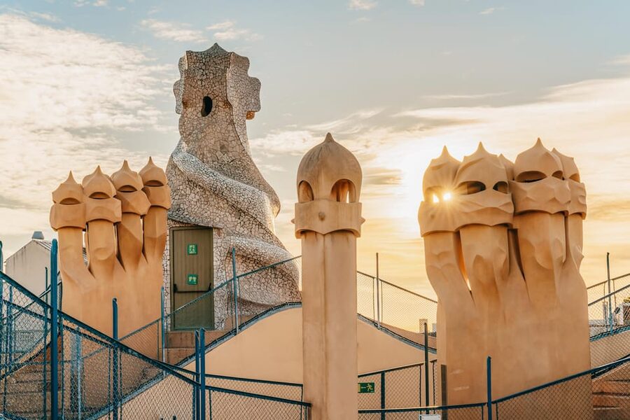 Barcelona: Casa Milà Early-Morning Access Guided Tour - Rooftop terrace views: morning light over Barcelona