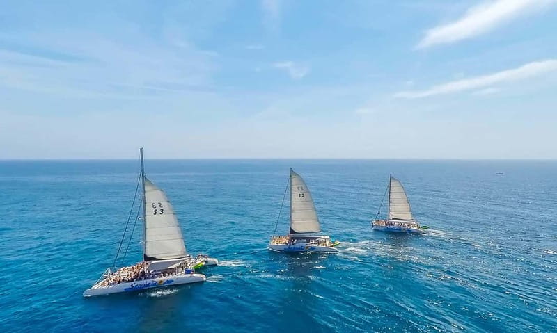 Barcelona: Catamaran Party Cruise with BBQ Meal - Catamaran Party Energy on Barcelona’s Coast