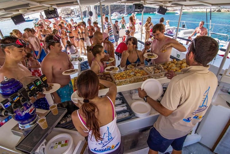 Barcelona: Catamaran Party Cruise with BBQ Meal - The Badalona swim stop: Mediterranean time with real rules