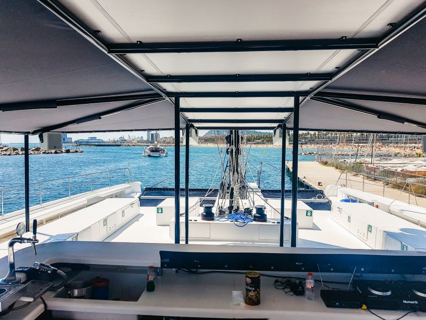 Barcelona: Catamaran Party Cruise with BBQ Meal - Music, dancing, and the crew-led vibe