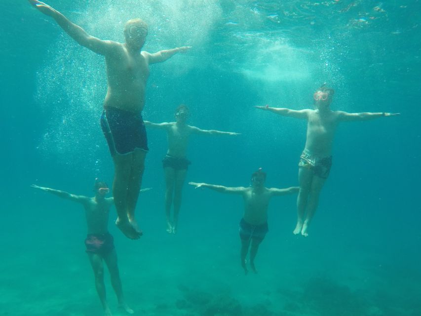 Barcelona: Costa Brava Kayak & Snorkeling Small Group Tour - Kayaking along rugged coves: what you do for 2–3 hours on the water