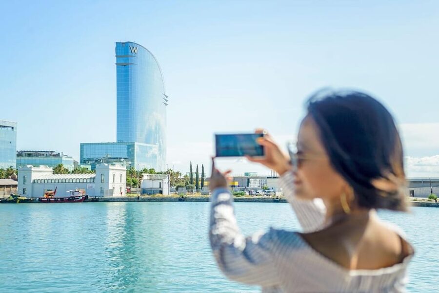 Barcelona: E-Bike Tour with Montjuic Cable Car & Boat Ride - Starting in El Raval, then gliding down Paral·lel Avenue
