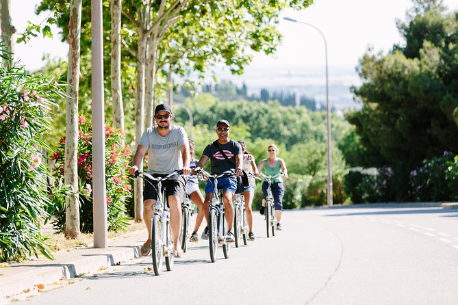 Barcelona Electric Bike Tour: Scenic Montjuic Panoramic Views - Getting started in Ciutat Vella and riding with a small-group pace