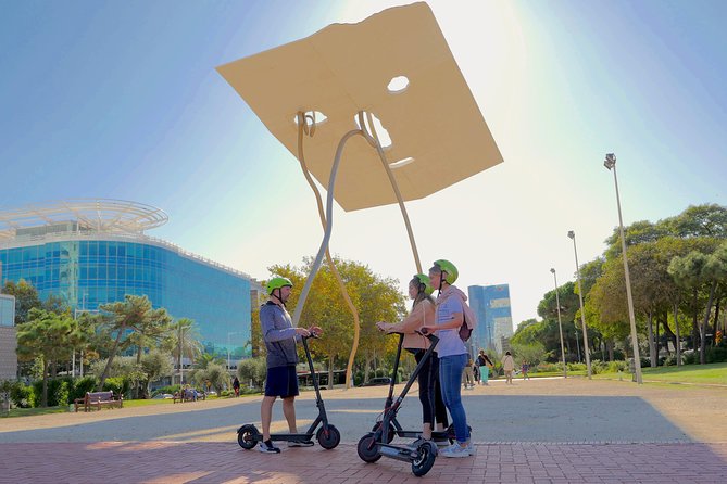 Barcelona Electric Scooter Tour - Port Vell art and sea walls: Lichtenstein and the fortifications