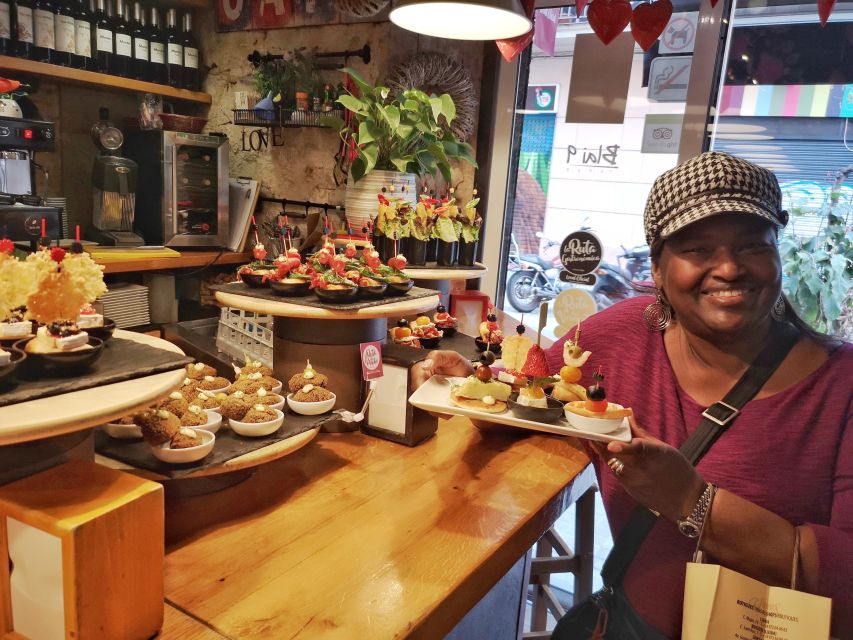 Barcelona: Food & Drink Tasting Tour in Traditional Taverns - Raval tastes: tapas comfort with patatas bravas and omelet