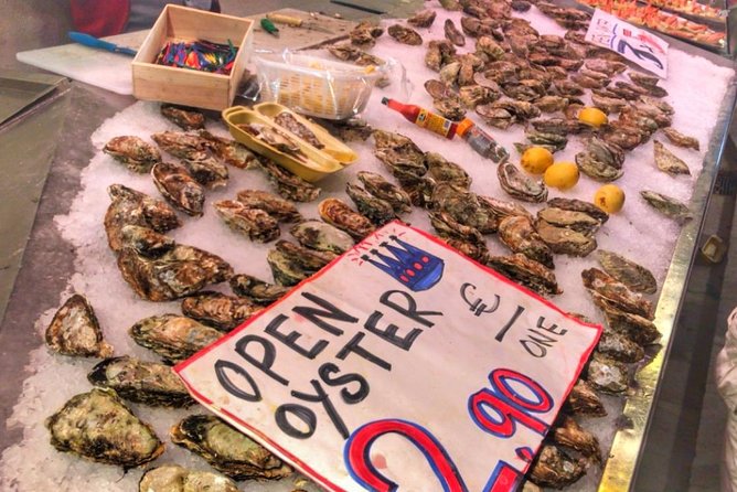 Barcelona Food Tour: Market & Gothic Quarter with Expert Guide - Mercat de la Boqueria: fried fish, cured meats, and how to shop smarter