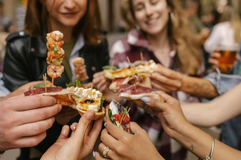 Barcelona: Food Walking Tour with Tapas and Wine - Nine tapas + four drinks: how the pacing feels in real life