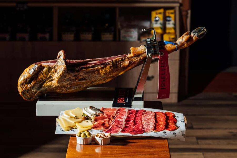 Barcelona Full Private Tapas & Historical Tour - First tastings: tapas and a typical Catalan drink in the maze of medieval streets