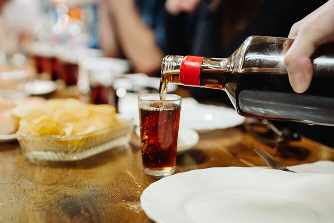 Barcelona Gracia Neighborhood Local Food & History Tour - Bar Roure lunch: typical Catalan tapas with wine or beer choice