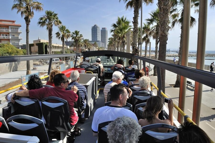 Barcelona: Hop-On Hop-Off Bus with Sailing Cruise - Orange West Route: FC Barcelona, Art Museums, and the City’s Outer Feel