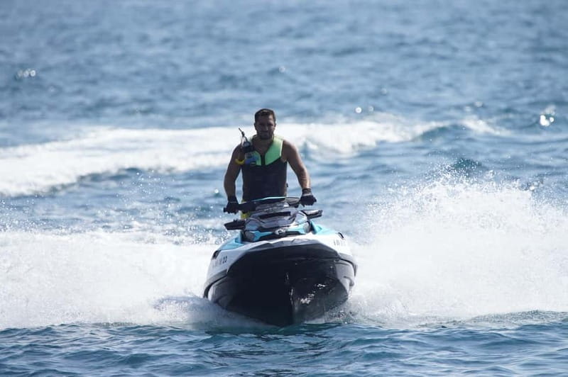 Barcelona: Jetski No Licence Tour Hotel W - Photo included - The 45-minute coastal circuit: Mapfre Towers to the beaches