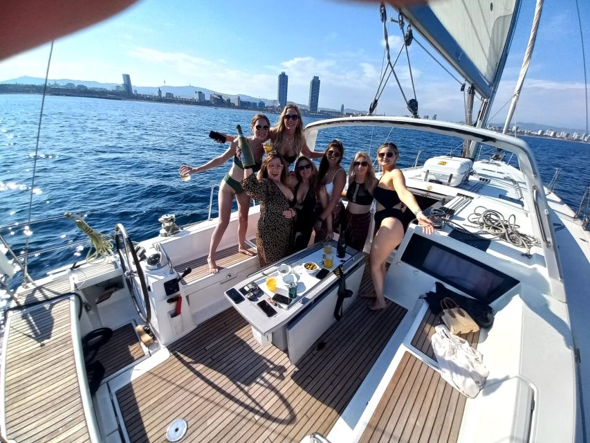 Barcelona: Luxury Private Sunset Yacht Cruise - The first stretch out of the harbor: sea breeze and landmark passing