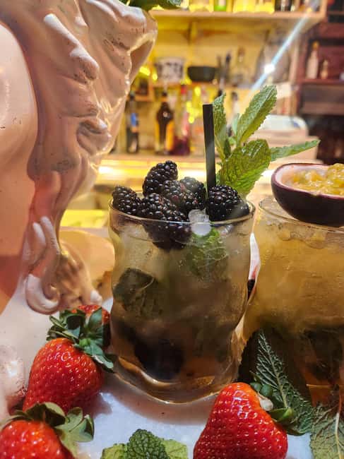 Barcelona: Mojito Tasting Experience & Tapas with Mixologist - Entering Bar Milans: Why the Gótico District Setting Matters