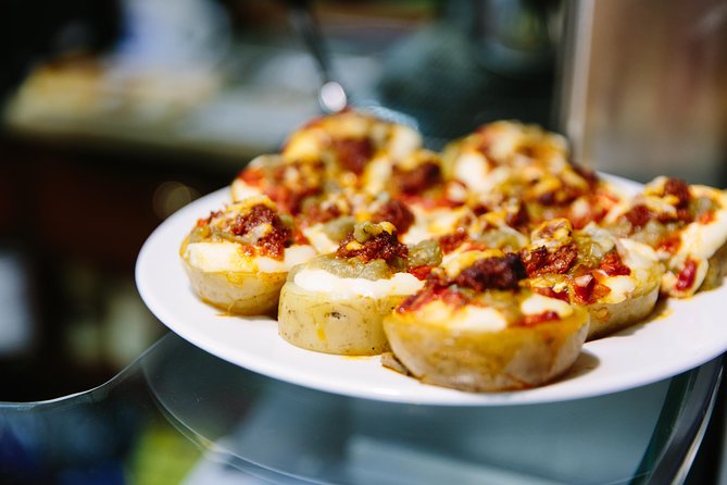 Barcelona Night Bike Tour with Local Tapas and Cava Stop - Casa Golferichs and Palau de la Música Catalana: Facades Worth Slowing For
