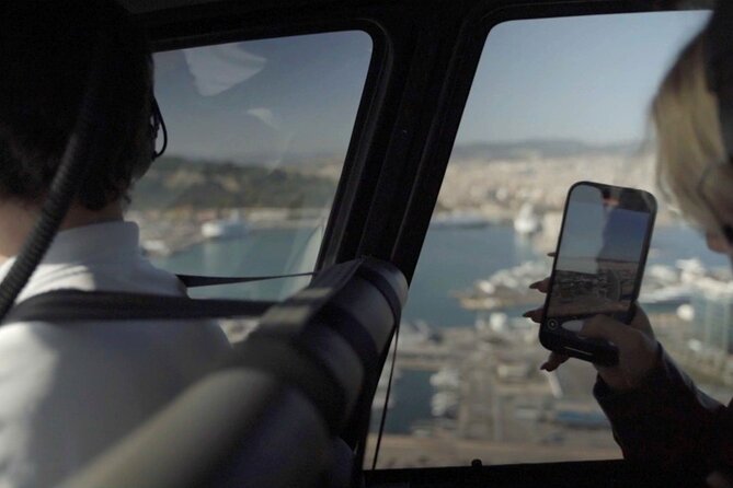 Barcelona Official Helicopter Tour with In-flight Video - Barceloneta Beach and Mar Bella Beach: Golden Sand, Promenade, Sea
