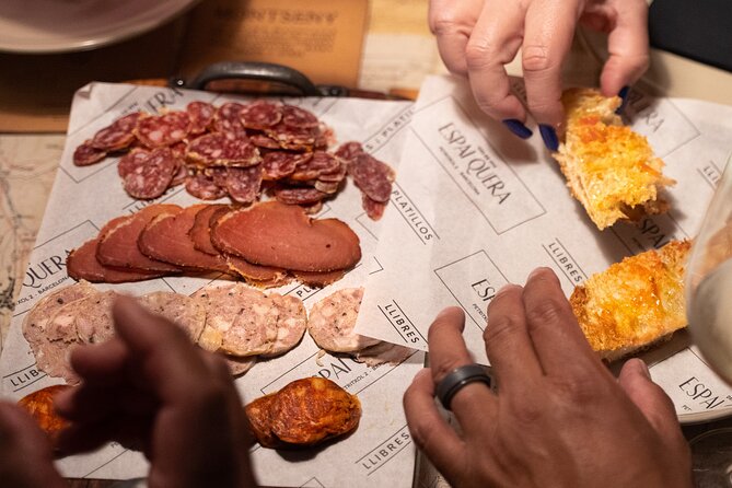 Barcelona Old Town Tapas Tour: Vermouth, Bites & Hidden Gems - Pont del Bisbe: the legend-under-your-feet photo moment