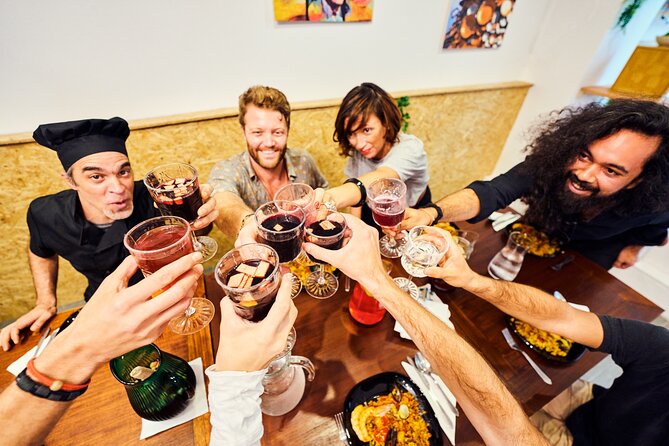 Barcelona Paella Cooking Class with Market Visit, Tapas & Sangria - Key highlights you’ll feel right away