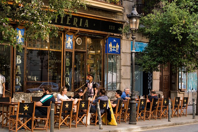 Barcelona Poble Sec Tapas & Wine Tour - Terrace culture and a mosaic façade: seeing Poble Sec up close