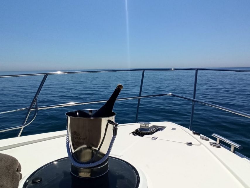 Barcelona: Private Motor Yacht Charter with Drinks and Food - A fishing village stop: snacks, drinks, and a slower pace