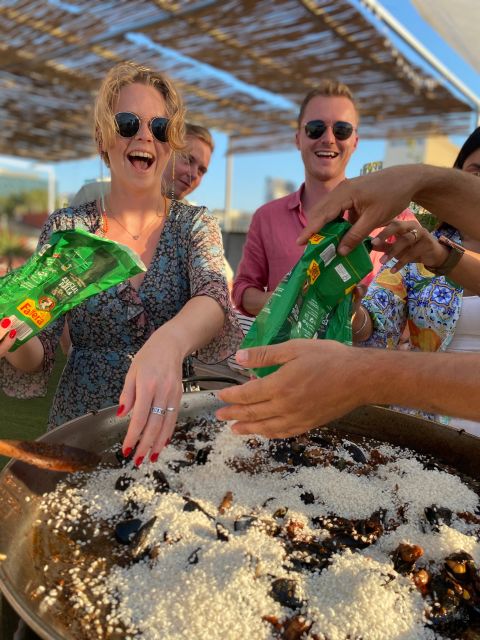 Barcelona: Rooftop Paella Cooking Class with Sangria - Paella lesson with context, then you cook for real