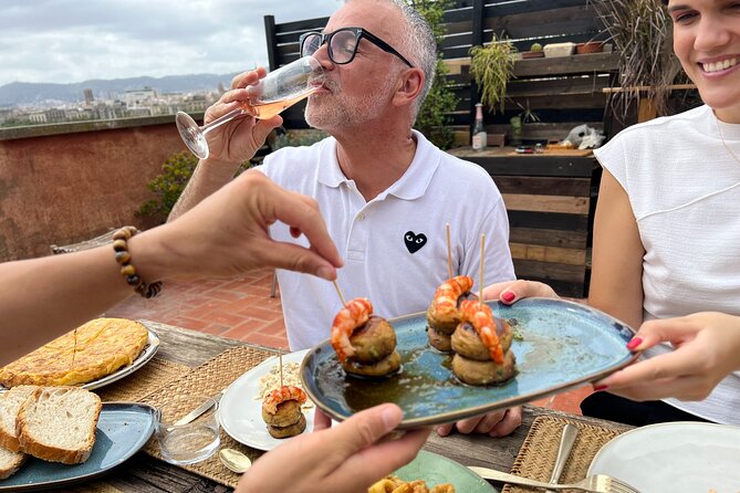 Barcelona: Rooftop Tapas & Sangria class with a Local Chef - Chef Alfonso’s Barceloneta welcome: lemonade, cava, and sea air