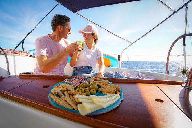 Barcelona Sailing Experience: Spanish Tapas and Premium Open Bar - Timing and departure choices: choose your mood