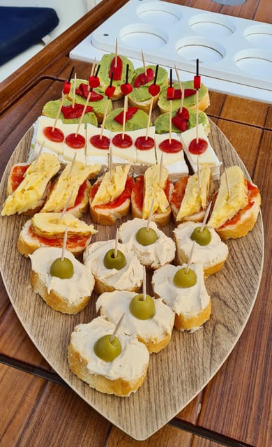 Barcelona: Sailing Tour with Spanish Tapas and Drinks - Tapas and Drinks On Board: What You’re Really Getting