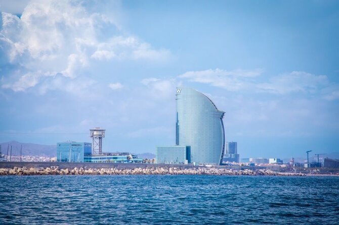 Barcelona Sailing Tour with Swimming, Snacks and Drinks - Swimming, paddle surf, and snorkeling: when the water actually cooperates