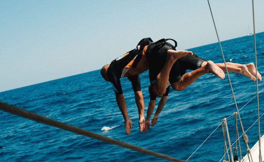 Barcelona: Sailing Tour with Young Local Captain & Drinks - The view point stop: Polaroid, wine, and the swim decision