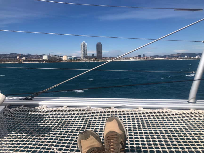 Barcelona: Shared cruise on a catamaran Drink+Local Tapa - La Barceloneta Photo Stop: The Coast Angle That Changes Everything