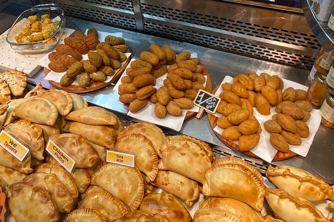Barcelona Street Food Tour with Local Market & City Center Visit - Mercat de la Boqueria: classic Catalan bites you can order with confidence