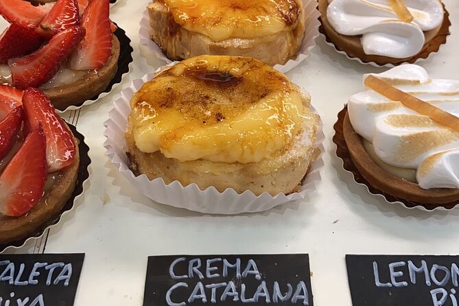 Barcelona Street Food Tour with Local Market & City Center Visit - Plaça del Rei and the Roman layers: where the guide makes place feel edible