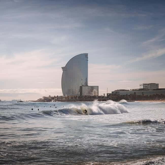 Barcelona: Sunrise or Sunset Paddle Surf with Photos - Price and value: what $53 really includes in Barcelona