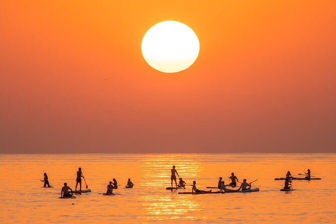 Barcelona: Sunrise Paddle Surf with Instructor and Photos - Timing, group size, and why 14 people matters