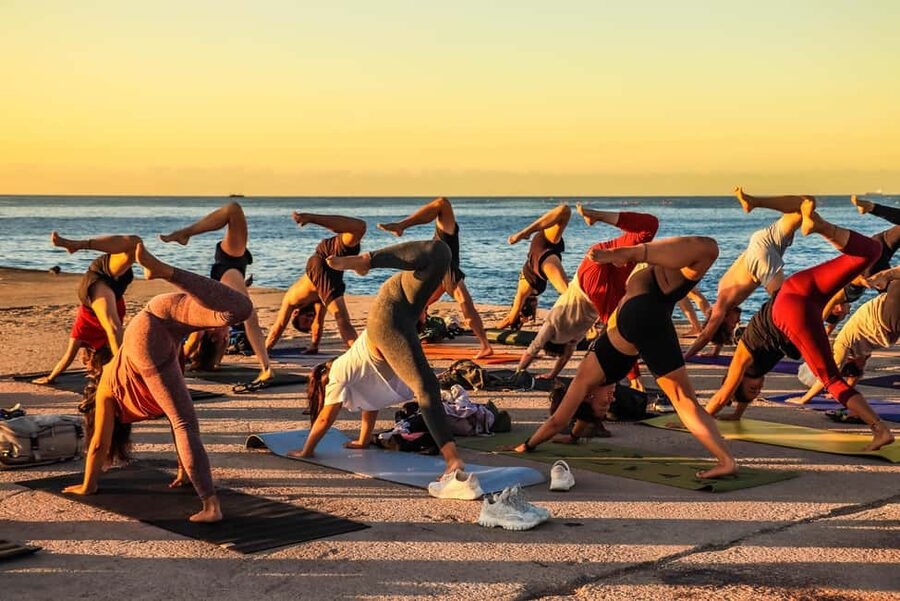 Barcelona: Sunrise Yoga by the Sea & Morning Dip - Coffee and Croissants in a Nearby Park: Social Time Without Pressure