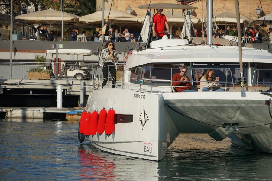 Barcelona: Sunset Catamaran Experience w/ optional Dinner - On-Board Comfort: Skipper, Wi‑Fi, Music, and Paddle Surf