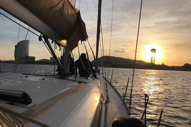 Barcelona Sunset Private Sailing with Light Snacks and Open Bar - Stop Highlights: Columbus, Sagrada Família, Tibidabo, and Montjuïc