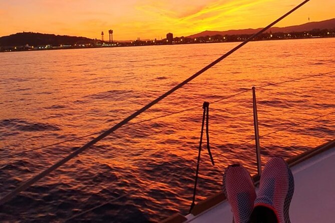 Barcelona Sunset Private Sailing with Live Saxophone and Open bar - Port Vell: Old Harbor Revival, Aquarium Excursions, and Swing-Bridge Views