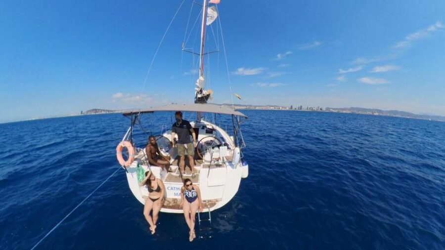 Barcelona: Sunset Sailing Experience with Snacks and Cava - Barcelona landmarks from the water: Sagrada Familia and Tibidabo