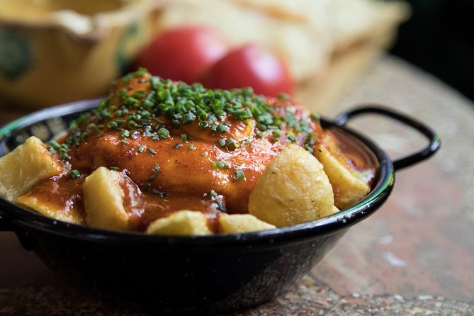 Barcelona Tapas Crawl Tour - Stop 1: Classic Tapas and a Local Drink Starter