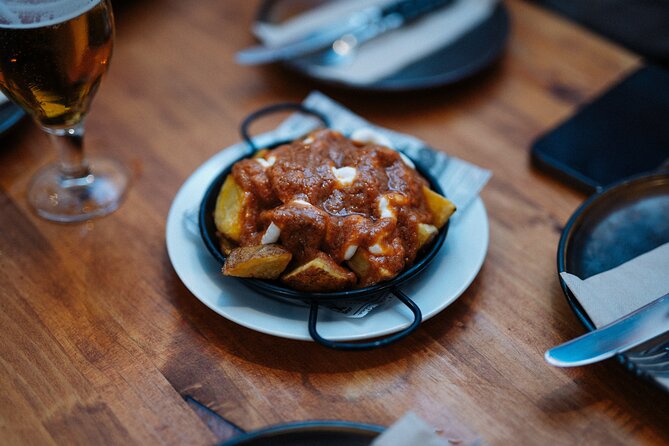 Barcelona Tapas Food Walking Tour with Wine in El Born - Price and what you eat and drink in 2 hours 30 minutes
