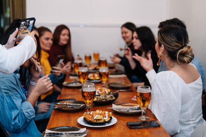 Barcelona Tapas Food Walking Tour with Wine in El Born - Gothic Quarter stops: croquettes, bravas, and wine with your walk