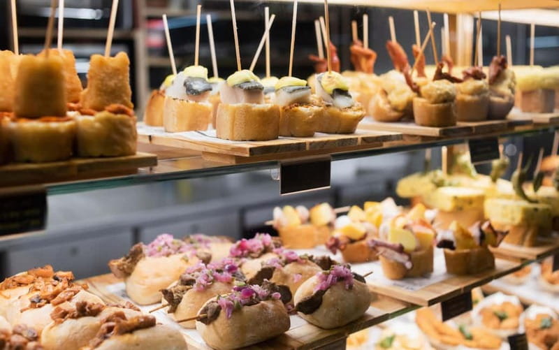Barcelona: The Ultimate Local Tapas & Drinks Food Tour - Stop-by-stop flavor logic: how the tour builds a full meal