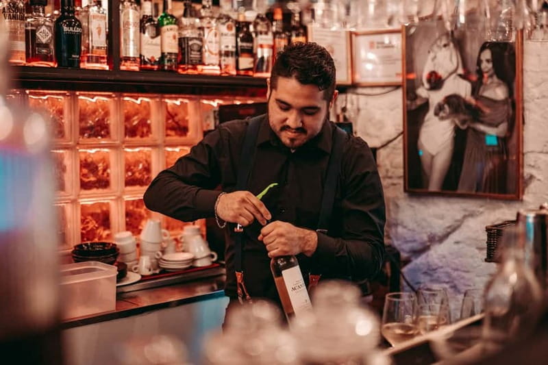 Barcelona: Tipsy Tapas & History Tour in the Gothic Quarter - Stop One in the Gothic Quarter: A Cozy Start with Two Classic Tapas